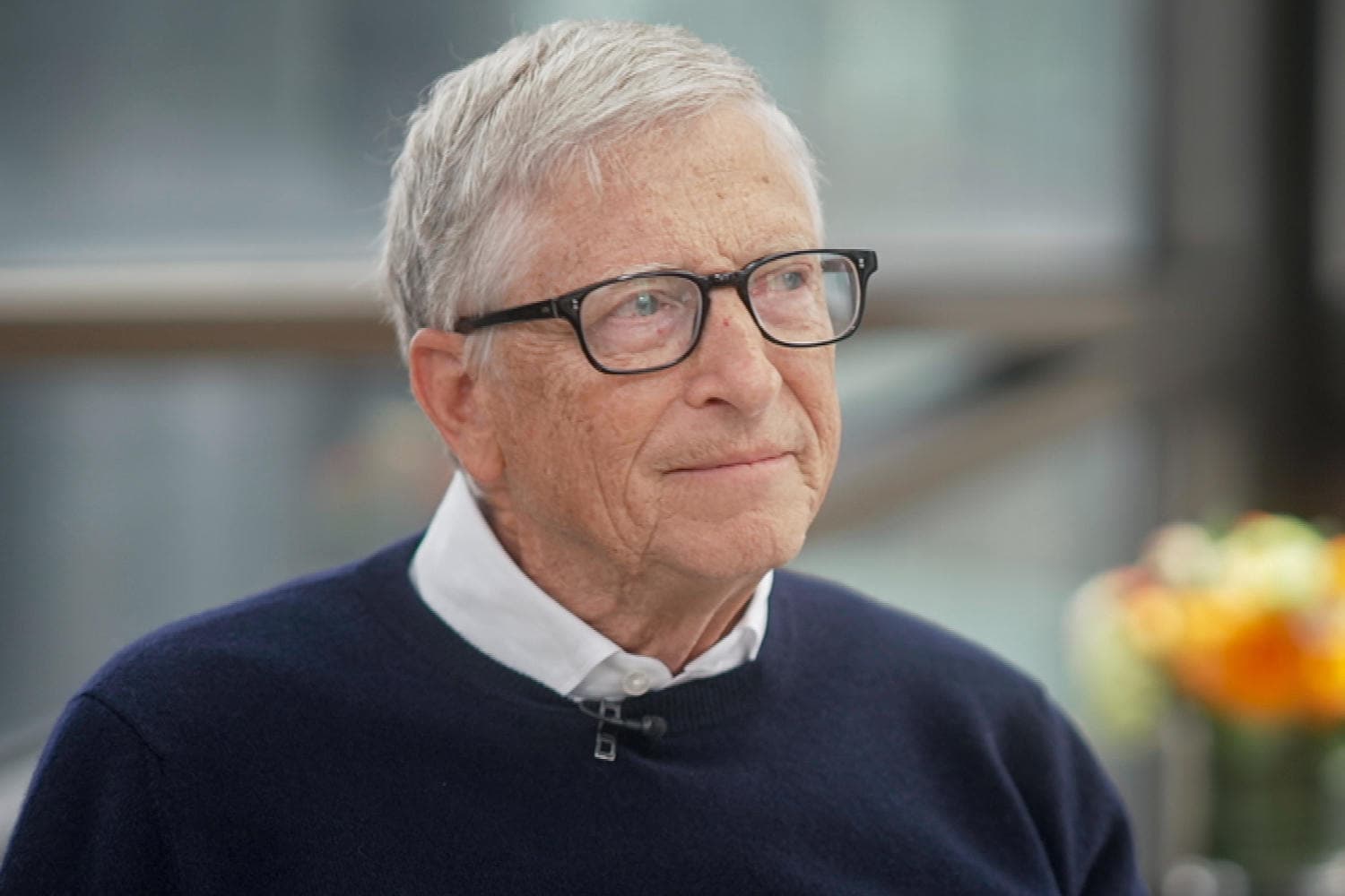 A graphic showing Bill Gates discussing AI regulation challenges, comparing it to Cold War nuclear negotiations.