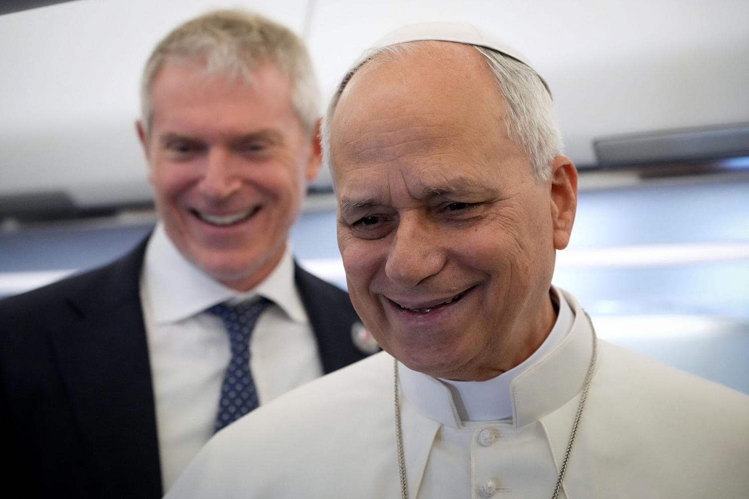 Pope Leo XIV endorsing press freedom aboard papal flight, symbolizing transparency in journalism.