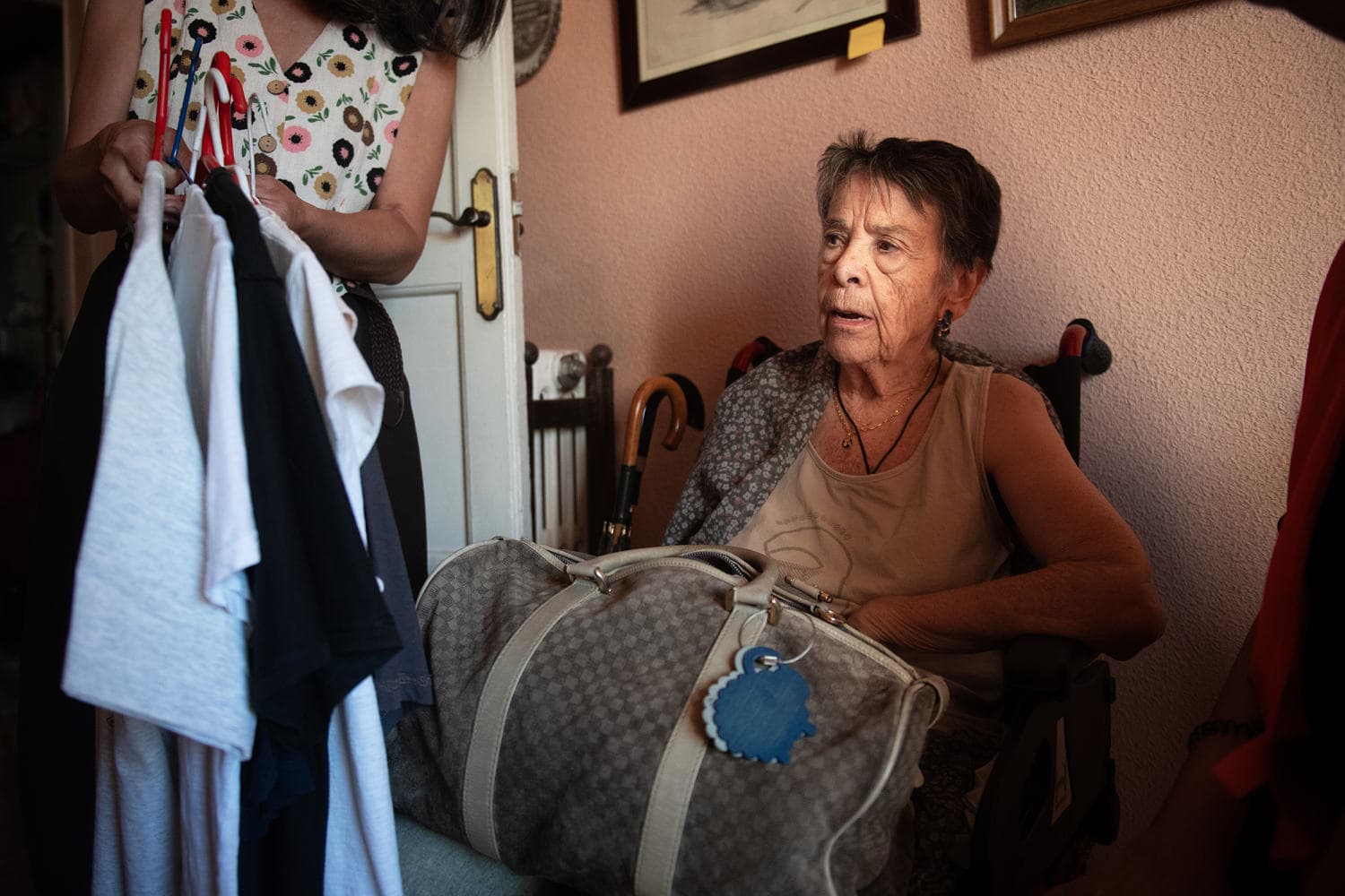 A protest scene in Spain following the eviction of an elderly tenant, highlighting the housing crisis.