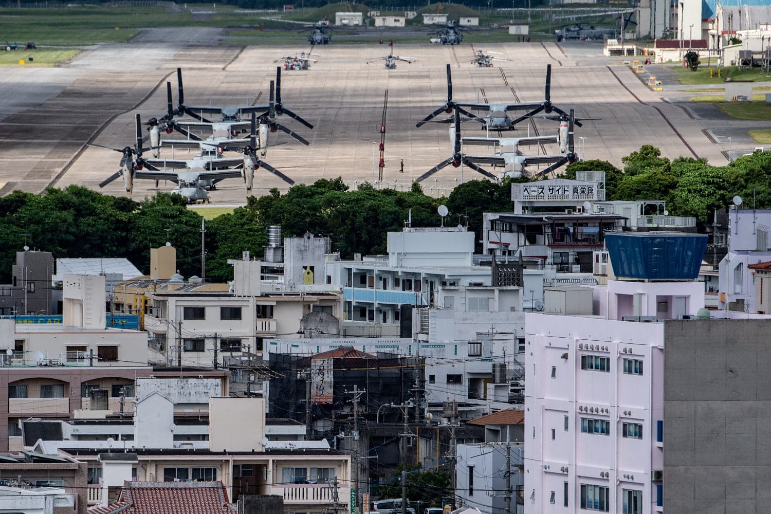 A graphic showing the tension between U.S. military presence and local sentiment in Okinawa.
