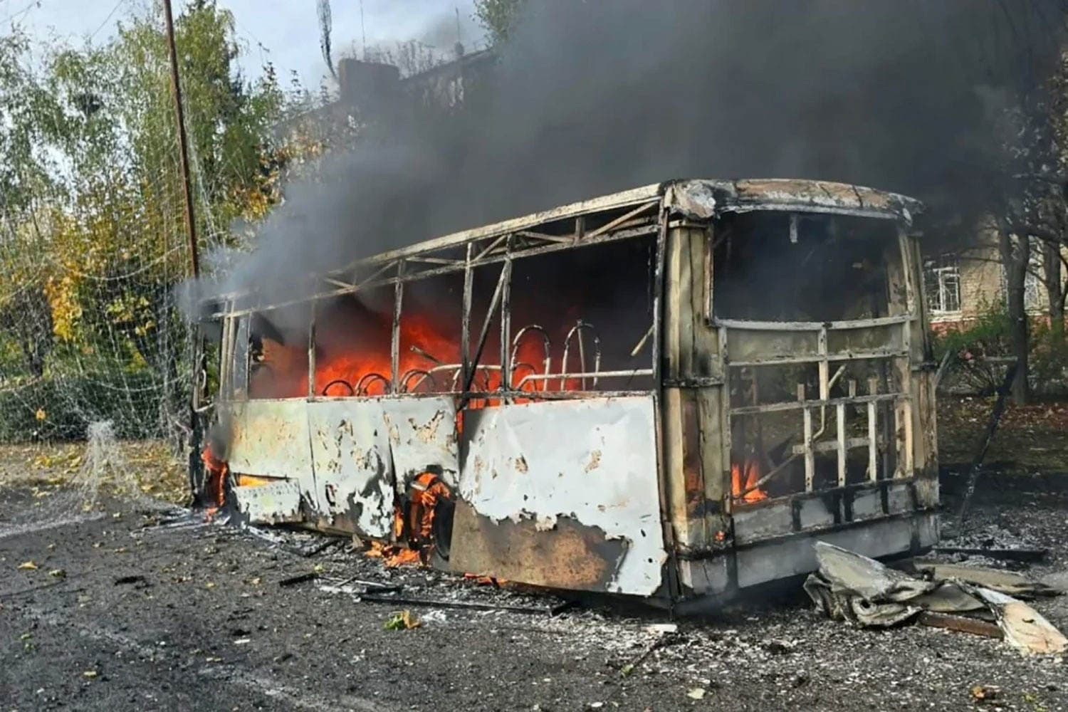 Aftermath of the Kramatorsk bus strike showing debris and emergency response, highlighting the impact of the conflict in Ukraine.