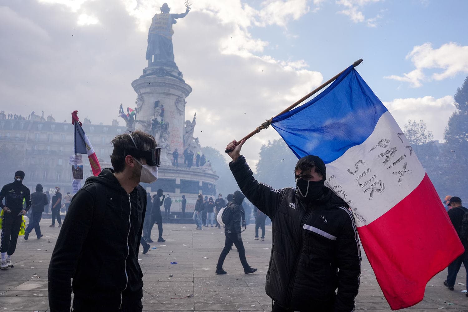 French President Macron addressing the nation about protest bans amid rising unrest.