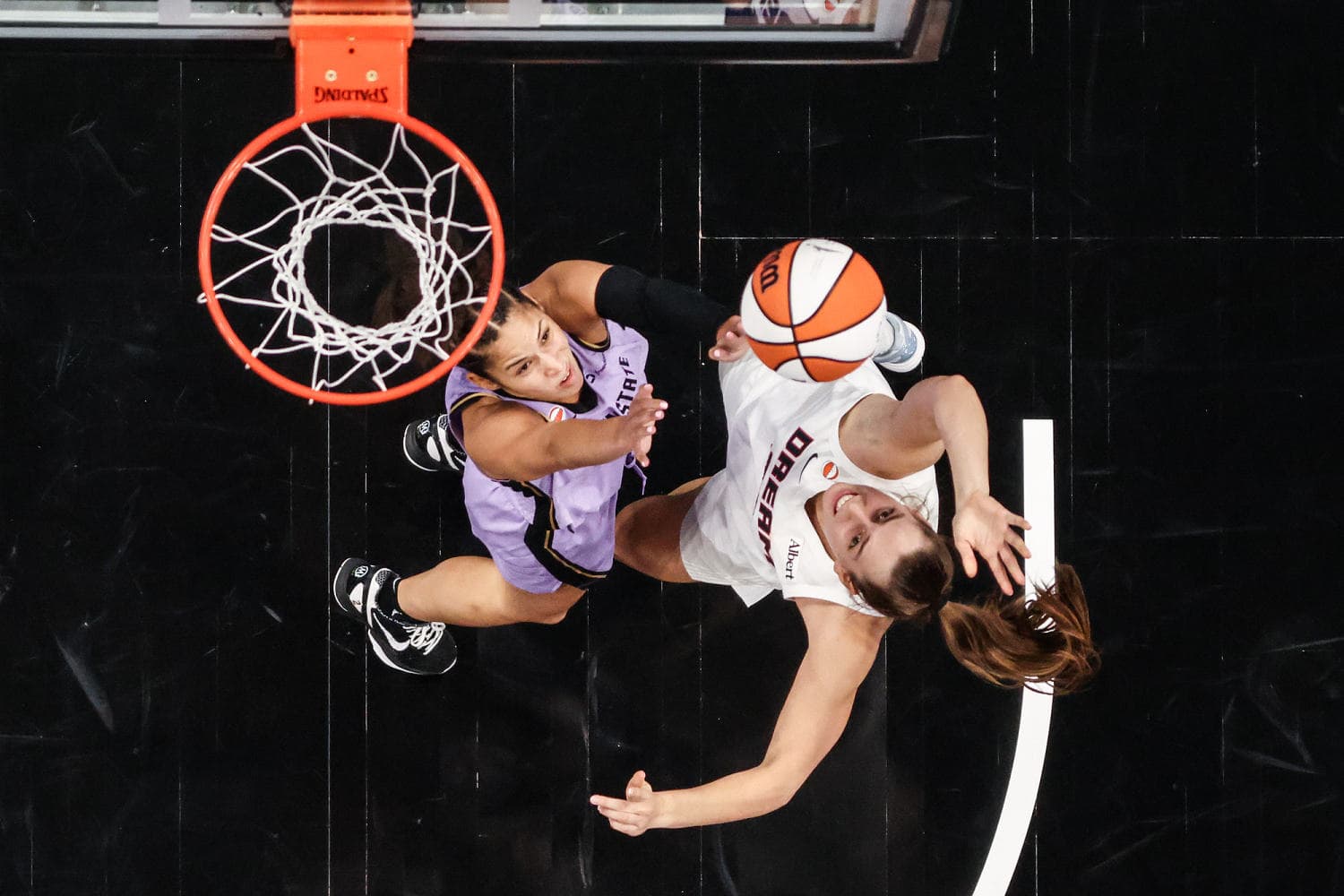 State Farm Arena basketball court setup highlighting the WNBA Finals Game 6 scheduling conflict