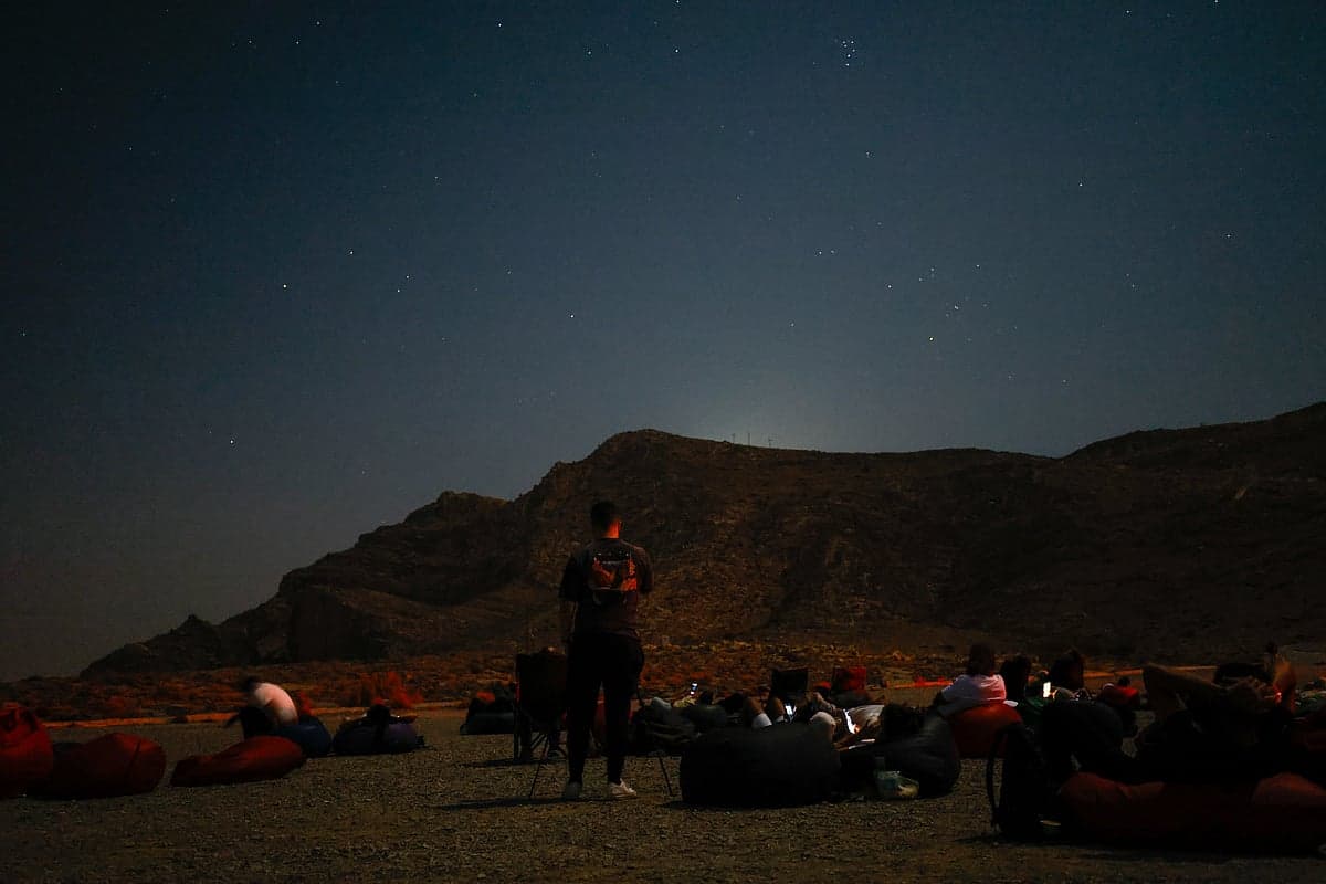 Stargazers observing the Perseid meteor shower in the UAE.