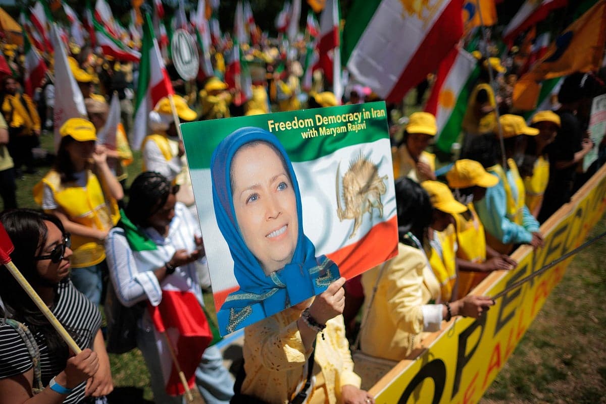 A somber image depicting the impact of executions in Iran amidst rising political tensions.