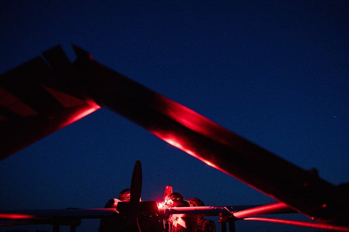 A drone flying over Moscow with a backdrop of military conflict.