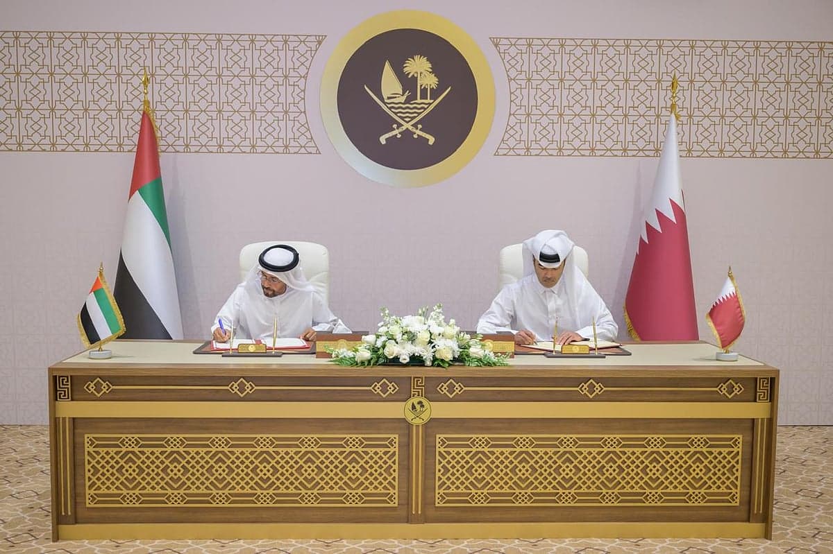 UAE and Qatar officials signing a Memorandum of Understanding for data protection in security initiatives.