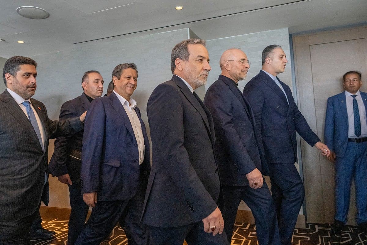 US and Iran flags symbolizing diplomatic negotiations
