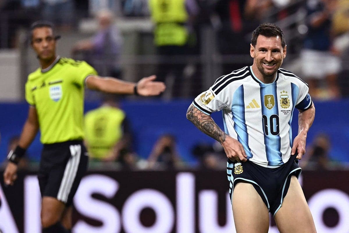 Lionel Messi celebrating after breaking the World Cup scoring record.