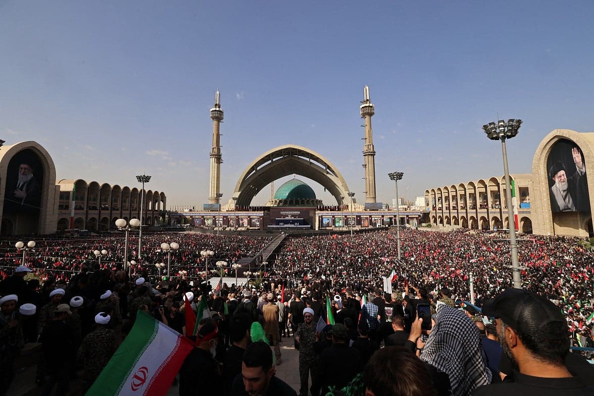 Crowds mourning the death of Iran's Supreme Leader Ali Khamenei.