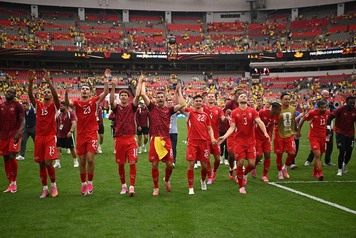 Switzerland's national football team celebrating their historic World Cup quarter-final victory.