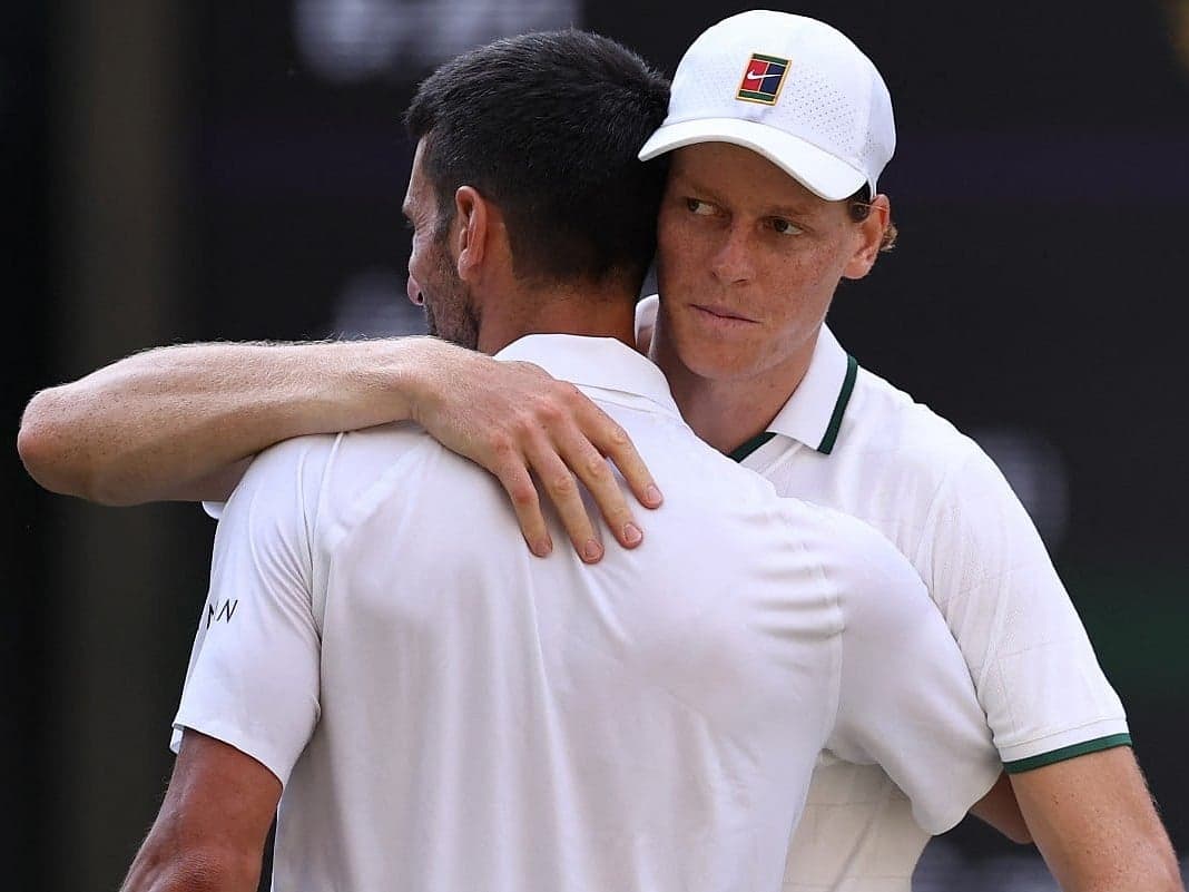Jannik Sinner celebrating his victory over Novak Djokovic at Wimbledon.