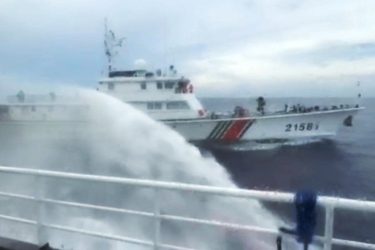 Philippine and Chinese coastguard vessels in confrontation in the South China Sea.