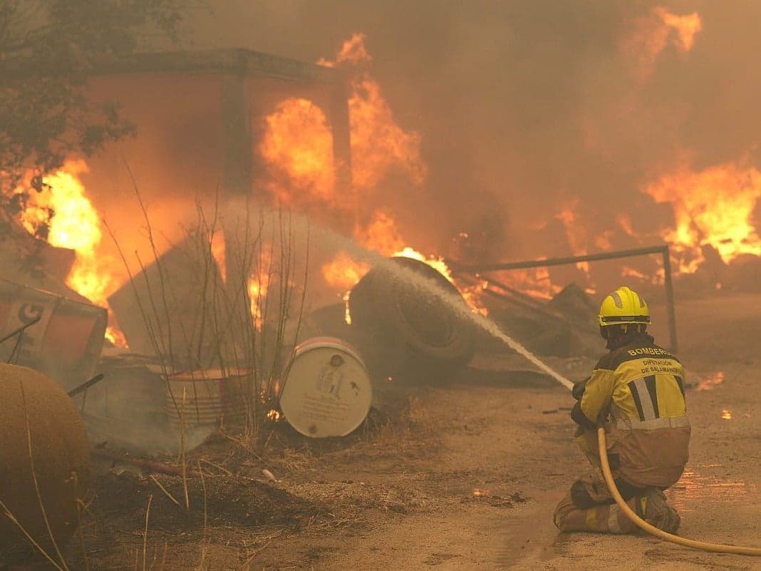 Firefighters battling wildfires near Madrid, Spain.