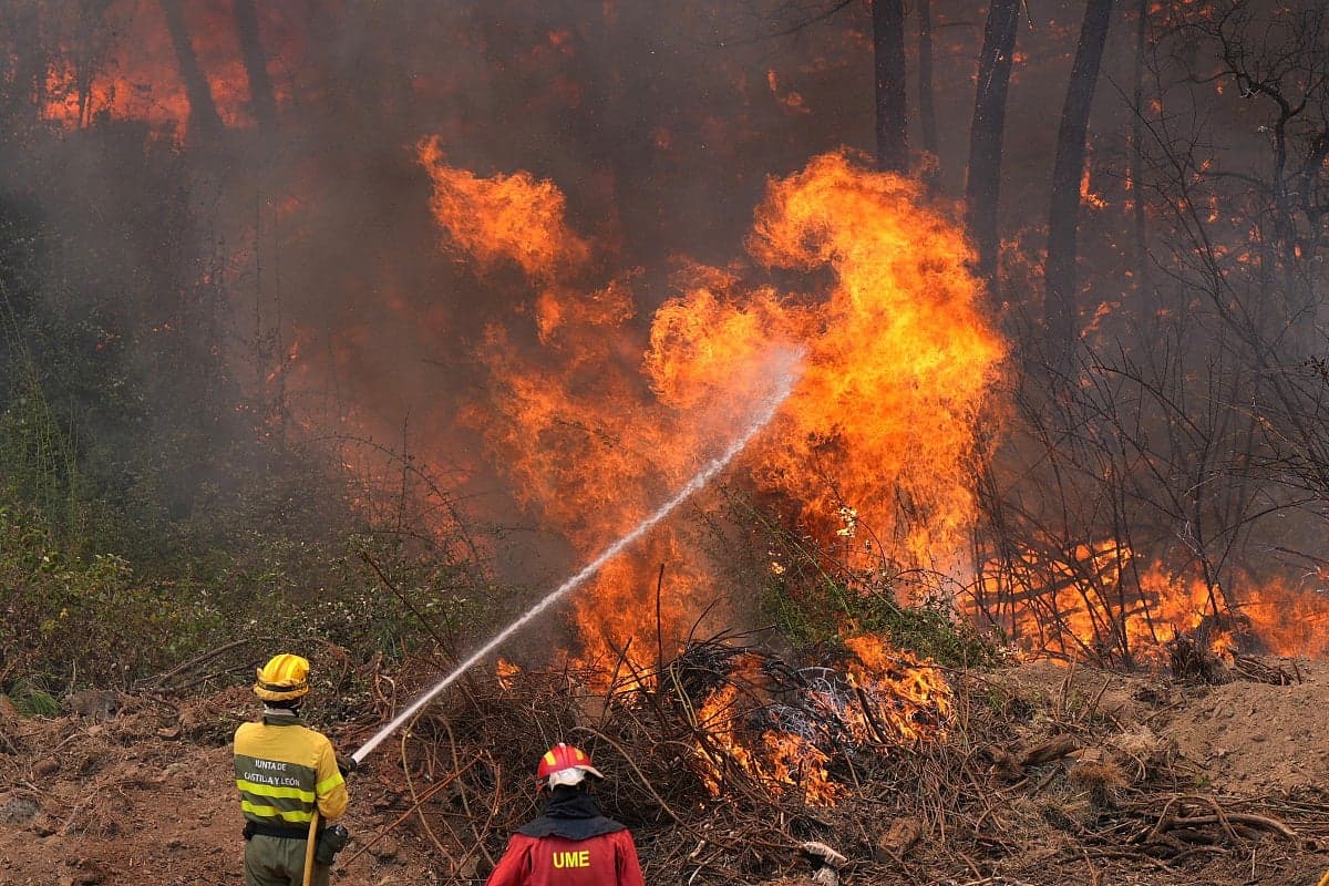 Evacuated residents fleeing wildfires in France and Spain.
