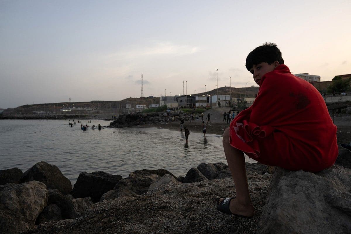 Migrants crossing into Ceuta from Morocco during the crisis.
