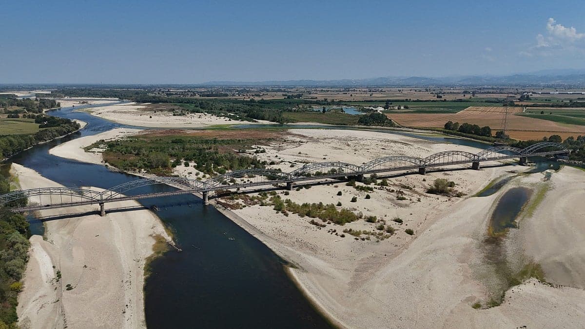 Aerial view of drought-affected agricultural fields in Europe during a heat wave.