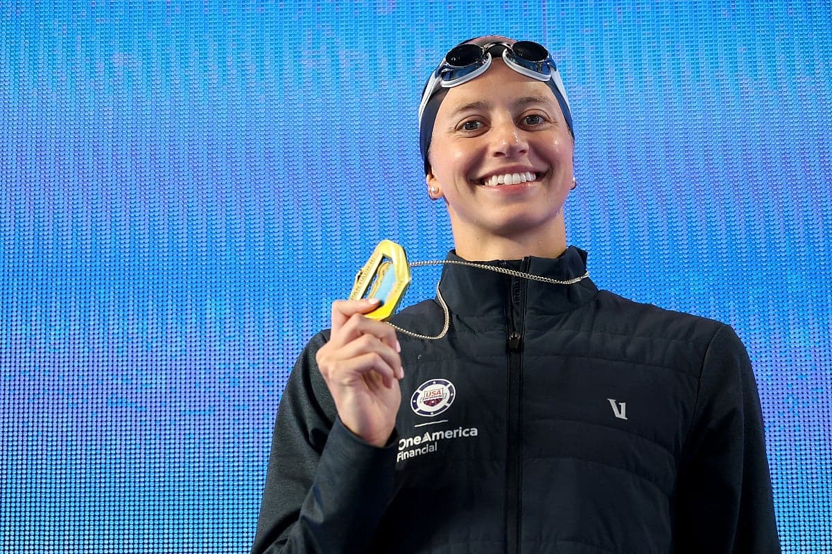 Kate Douglass celebrating her world record achievement at the Pan Pacific Championships.