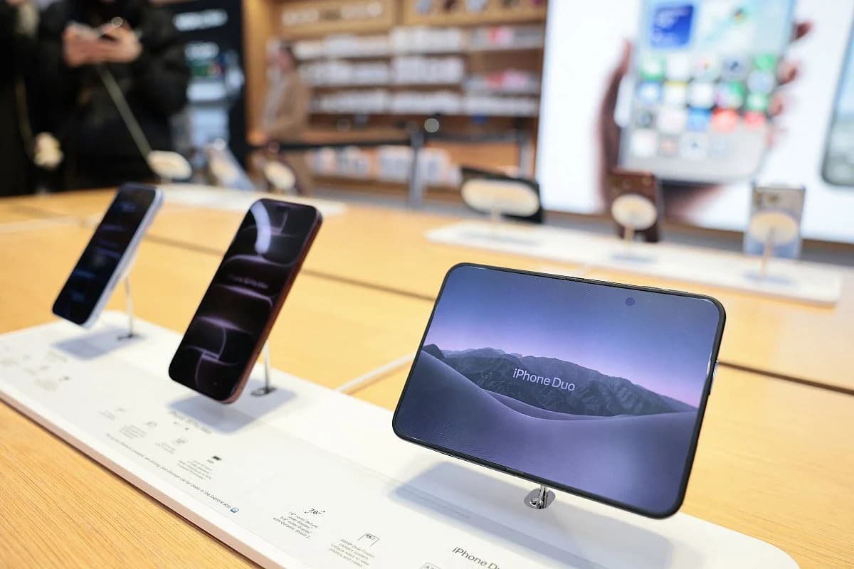 The unfolded inner display and central hinge mechanism of an iPhone Duo showing screen integrity details.