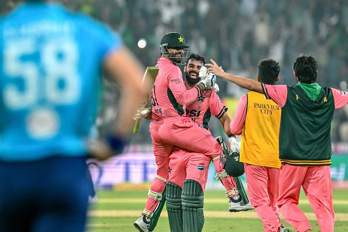 Pakistan all-rounder Shadab Khan celebrating his record 113 century against England at Gaddafi Stadium