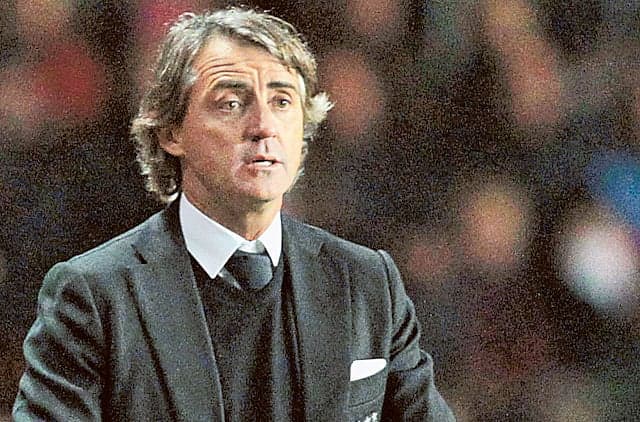 Roberto Mancini during a press conference announcing his reappointment as Italy's head coach.