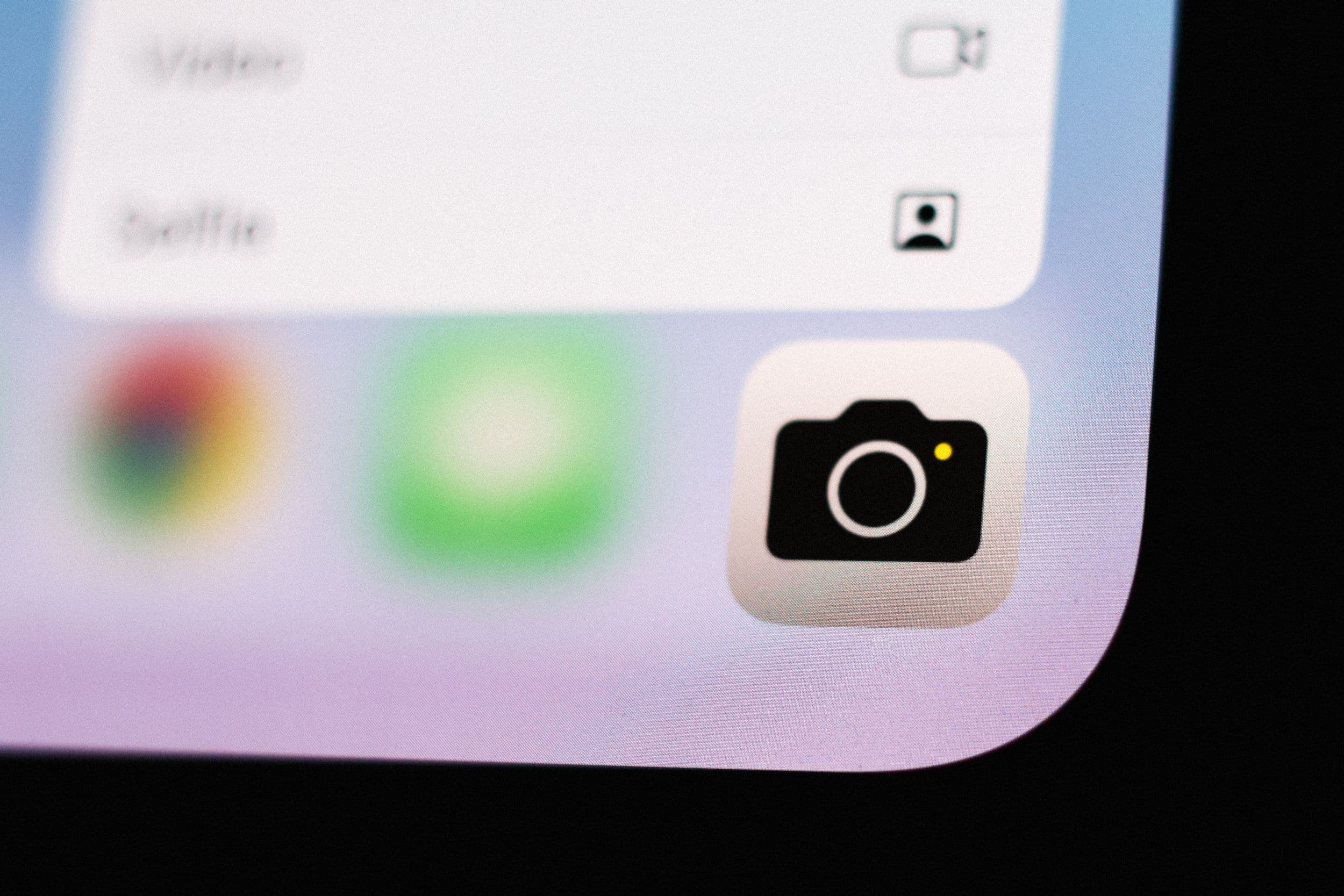 A modern iPhone displaying the new AI features in the Camera app, emphasizing its enhanced functionality.