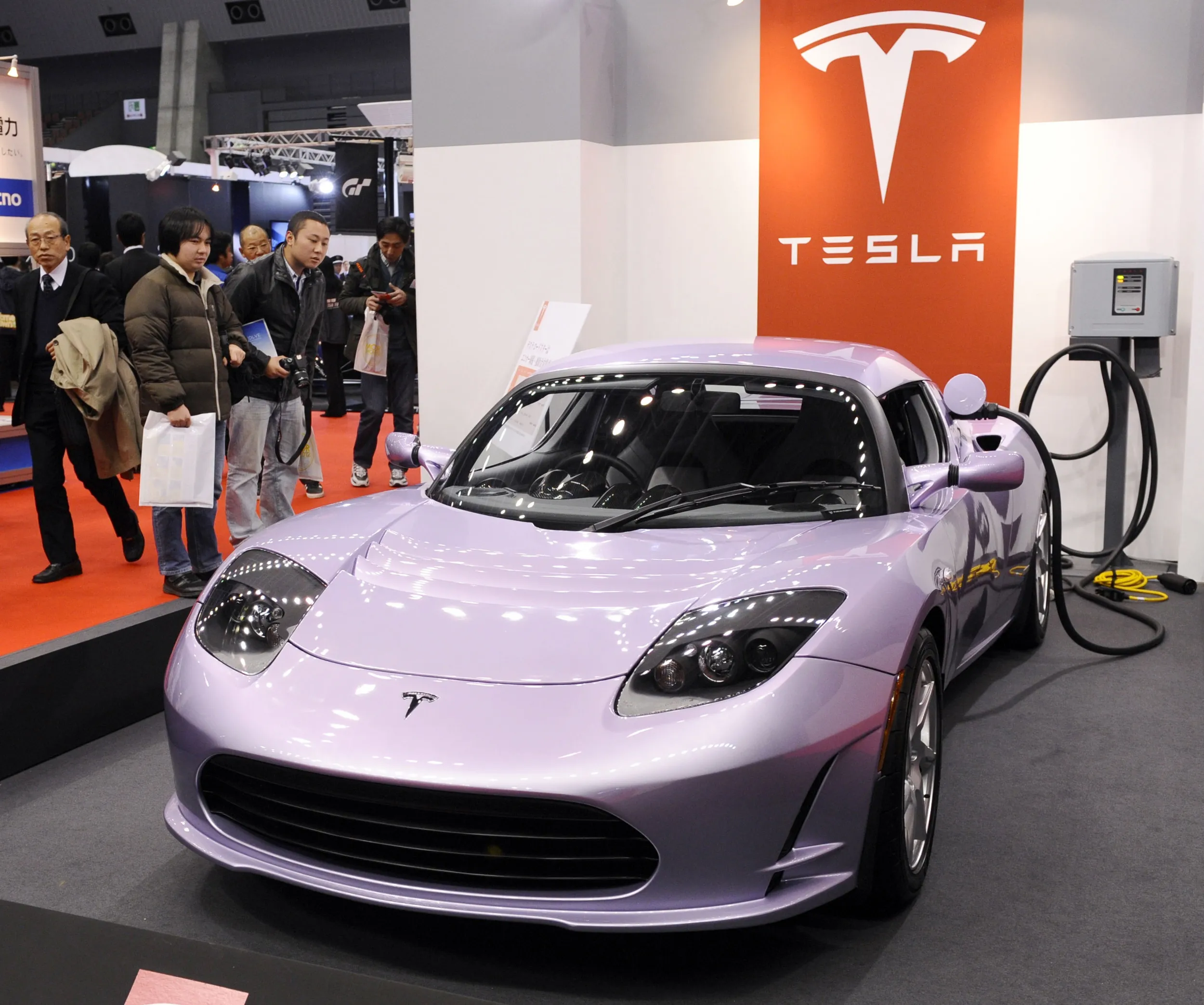 Tesla Roadster 2 showcasing advanced features and SpaceX technology in a sleek design.