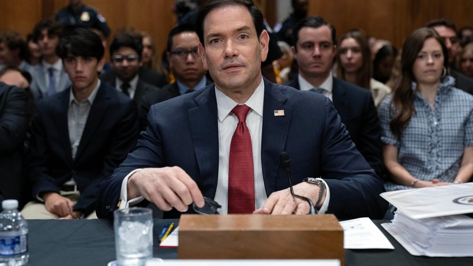 Marco Rubio preparing for congressional testimony on the Iran war, highlighting U.S. foreign policy implications.