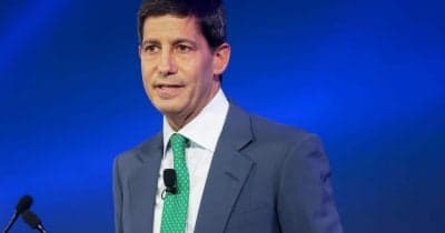Kevin Warsh being sworn in as Federal Reserve Chair, highlighting inflation challenges.