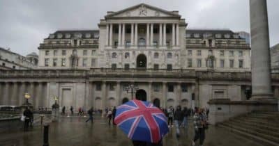 Bank of England building with digital finance graphics