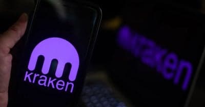 Kraken logo with a backdrop of Dubai's skyline representing cryptocurrency expansion.