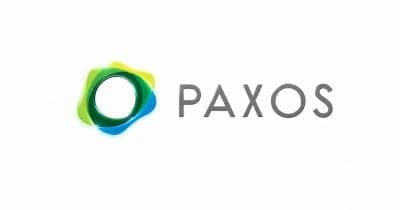 Paxos logo with a blockchain background representing financial innovation.