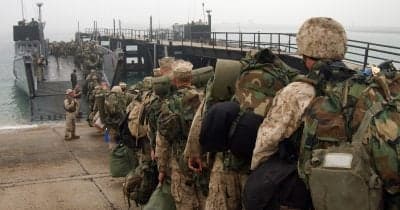 U.S. military personnel at a base in Kuwait following missile strike
