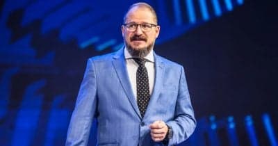 Qualcomm CEO Cristiano Amon speaking at Computex 2026 about AI's impact on technology.