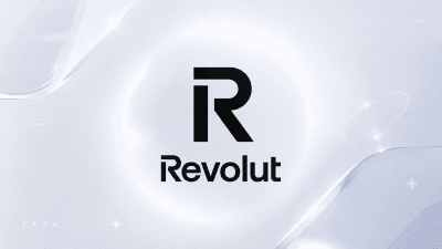 Revolut's logo with a backdrop of U.S. financial symbols