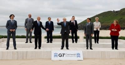 G7 leaders discussing cybersecurity measures against North Korea's cyber threats.