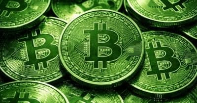 BlackRock logo with Bitcoin symbols representing institutional investment trends.