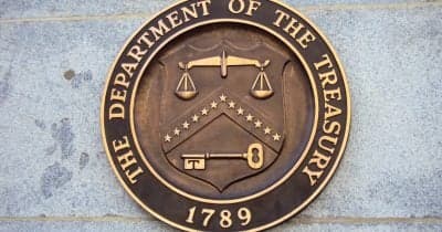 U.S. Treasury building with a Bitcoin symbol overlay