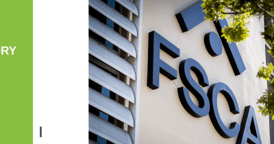 South Africa's central bank building with cryptocurrency symbols