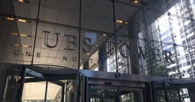 UBS Financial Services building with a focus on compliance issues.