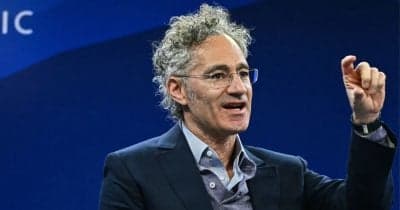 Palantir CEO Alex Karp speaking at a conference on AI and enterprise solutions.