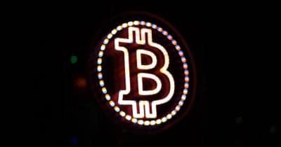 Bitcoin price chart showing fluctuations amid geopolitical tensions and economic data
