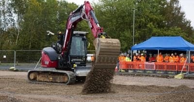 SoftBank logo alongside Gravis Robotics' branding with construction imagery.