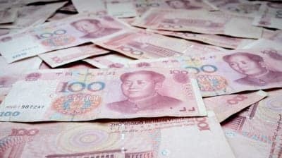 Infographic showing the expansion of the digital yuan network and its implications for global trade.