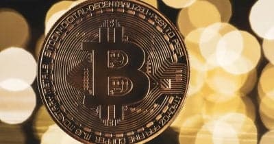 Infographic showing $2.6 billion inflows into Bitcoin and Ether ETFs with performance graphs.