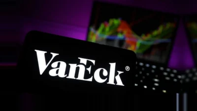 Bold typographic card displaying 0.26% fee for VanEck Wealth Builder ETF WBMO launch