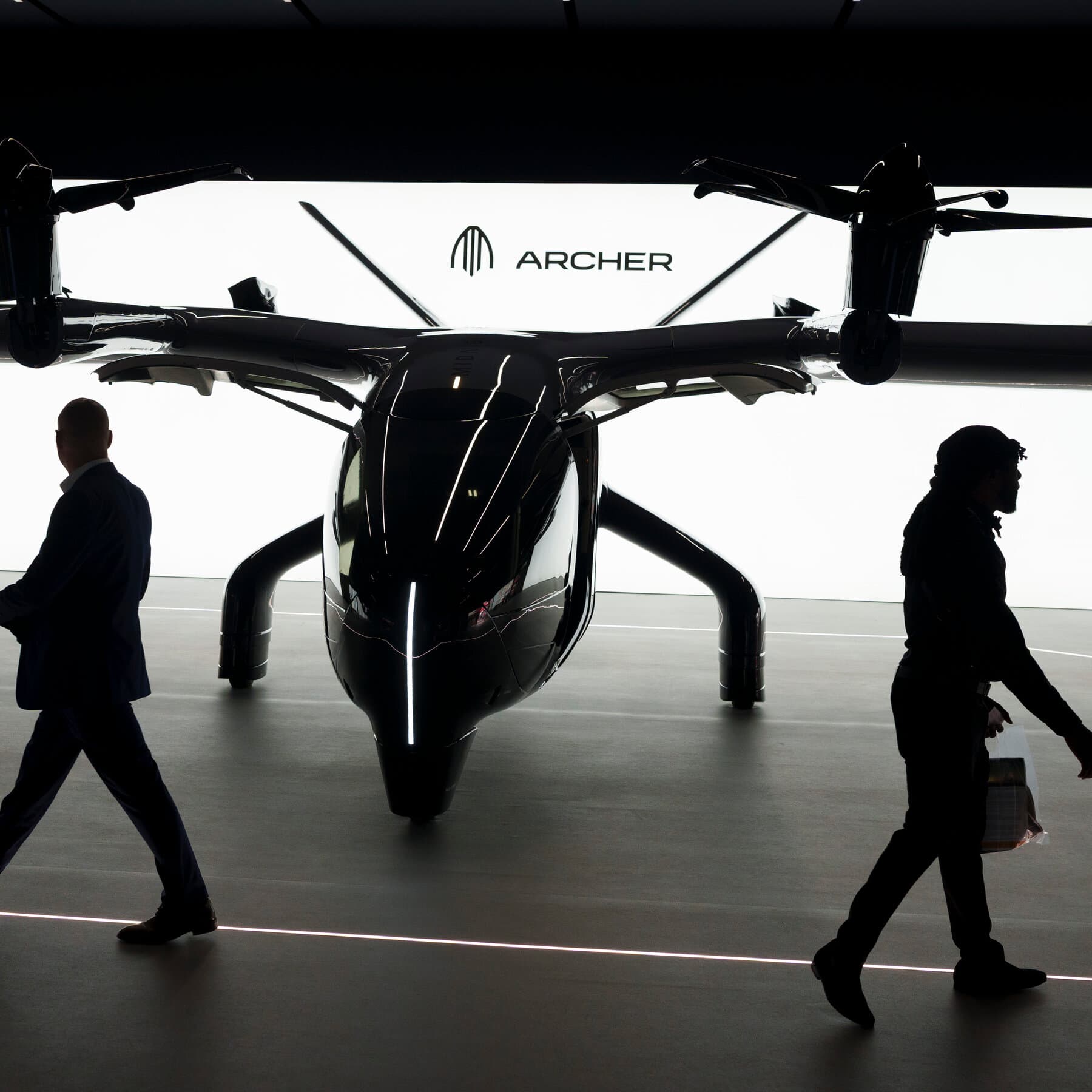 Boeing and Archer Aviation logos with electric aircraft imagery