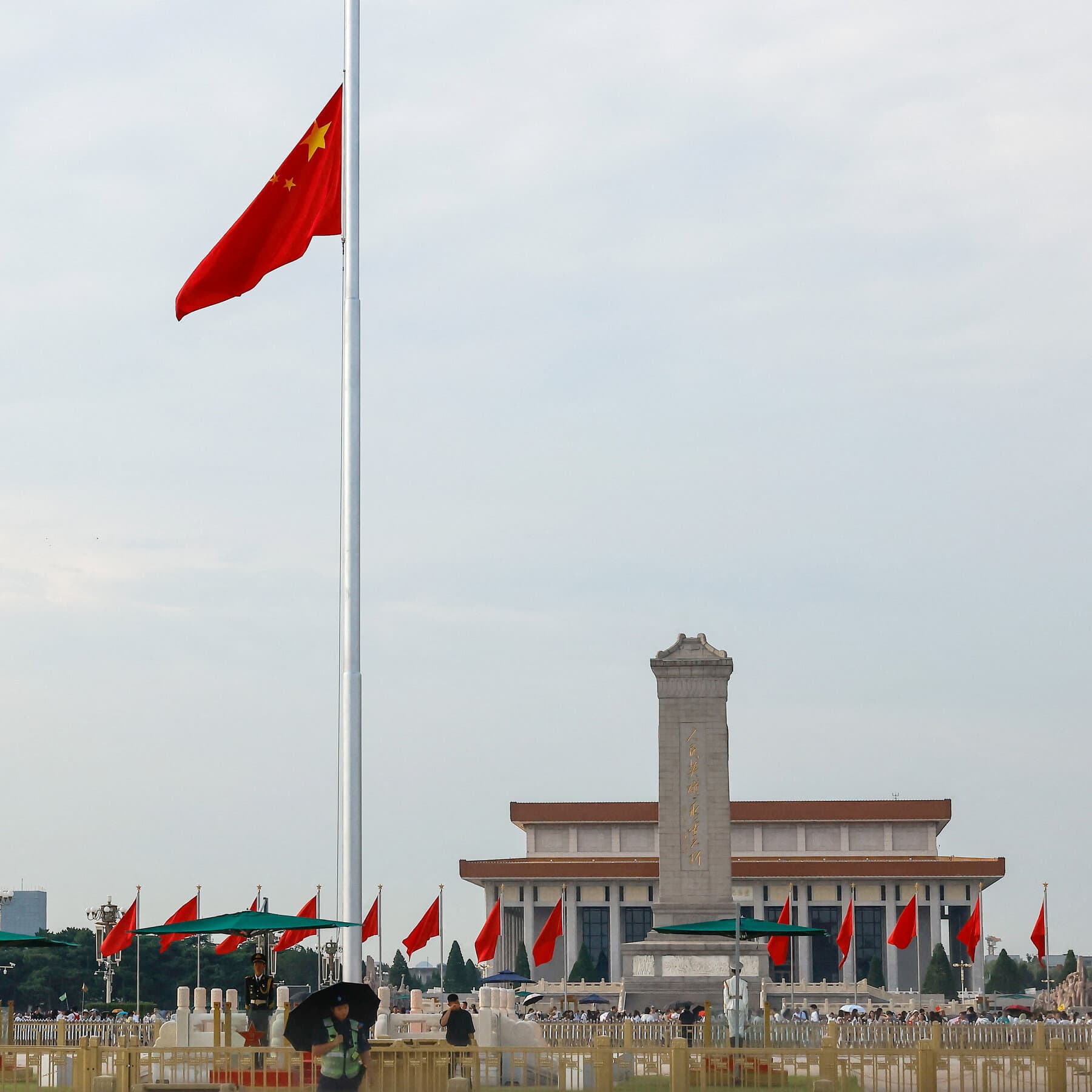 Zhu Rongji's state funeral in Beijing, symbolizing nostalgia for China's reform era.