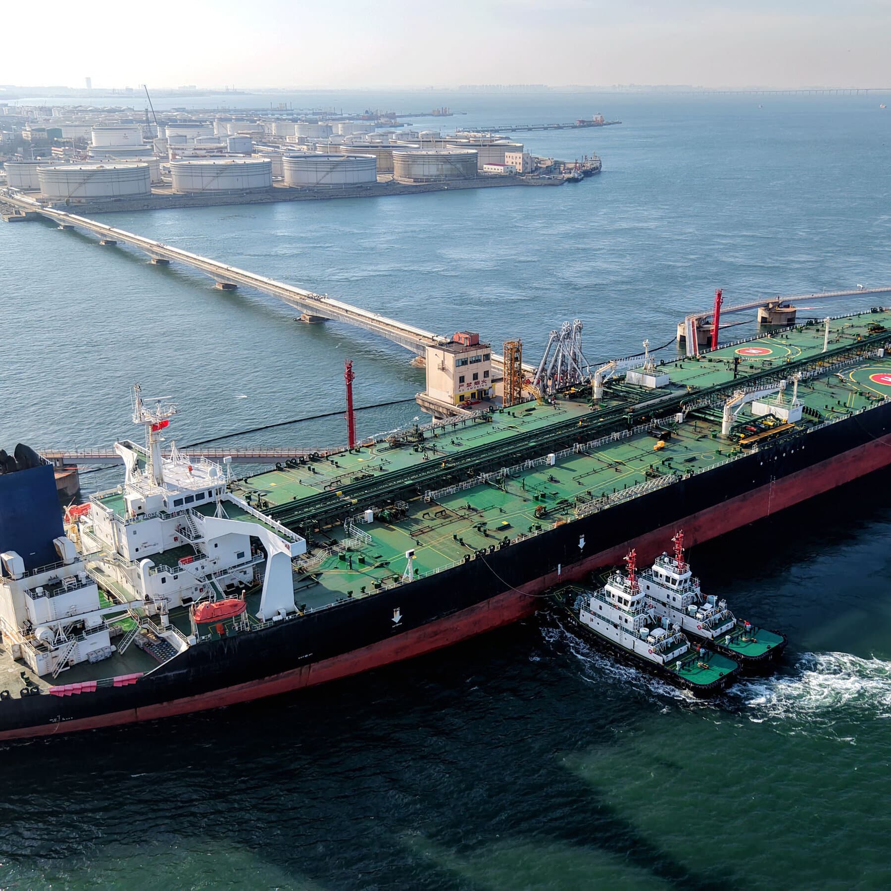 Infographic showing China's oil purchases from Iran and U.S. sanctions impact.