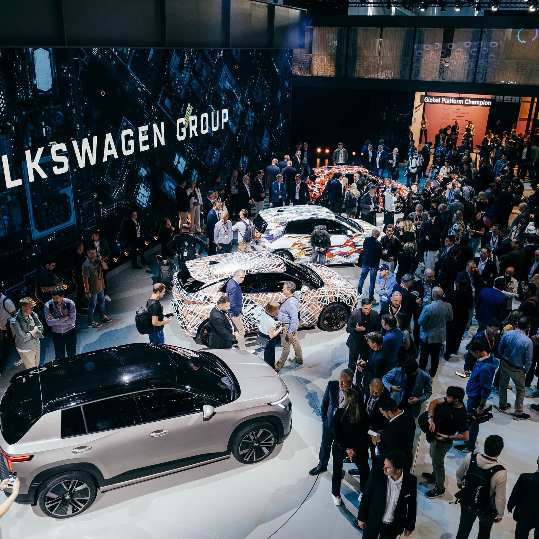 Infographic detailing Volkswagen's job cuts and restructuring plan in the automotive industry.